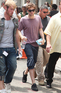 Robert Pattinson being escorted off-set by his entourage of bodyguards during a break from filming 'Remember Me' in New York City
