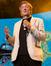 Stephen Fry making an appearance on-stage at the London iTunes Festival 09