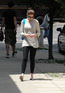 Anne Hathaway walking home after having lunch with a friend and in the West Village, New York City.