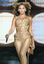 Beyonce strides on stage at a concert in Los Angeles.