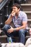Gerard Butler eating an apple while on the set of his new movie 'The Bounty', New York City.