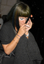 Lily Allen looking very GaGa-esque lighting up a cigarette as she leaves the London Nobu restaurant