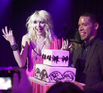 Taylor Momsen blowing out candles to celebrate her 16th birthday at Hiro Ballroom, New York City
