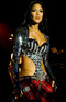 Pussy Cat Doll Nicole Scherzinger performs at Sandown Park in Surrey.