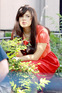 America Ferrera checks her cell phone during a break from filming 'Ugly Betty', New York City