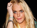 Lohan 'denies being escorted from hotel'
