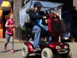 POTD: The Jacksons cause trouble on a scooter