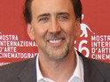 Cage cancels screening after dad's death