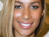 Man charged over Lewis assault