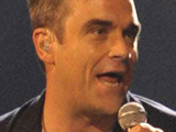 Robbie Williams joins Take That on stage