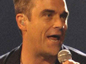Robbie to make one-off Take That return