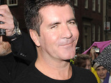Cowell praises 'world's most famous boy'