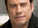 Travolta: 'Helping Haiti eased my grief'