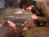 Doctor Who S05E08: The Hungry Earth - The Doctor holds onto Amy as the ground swallows her