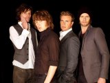 Take That hint at Robbie return