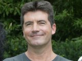 Cowell to split with girlfriend
