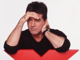 Cowell signs with ITV through 2008