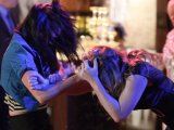 Tanya and Stacey scrap at Peggy's party